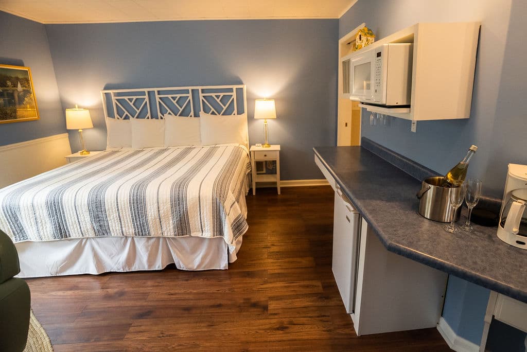 Kitchenette which includes counter space, microwave, mini fridge, coffee maker and sink